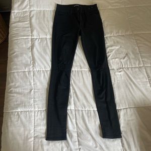 Black express holy jeans
